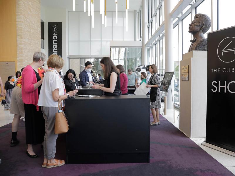 volunteers work the gift shop at the 2022 Cliburn Competition