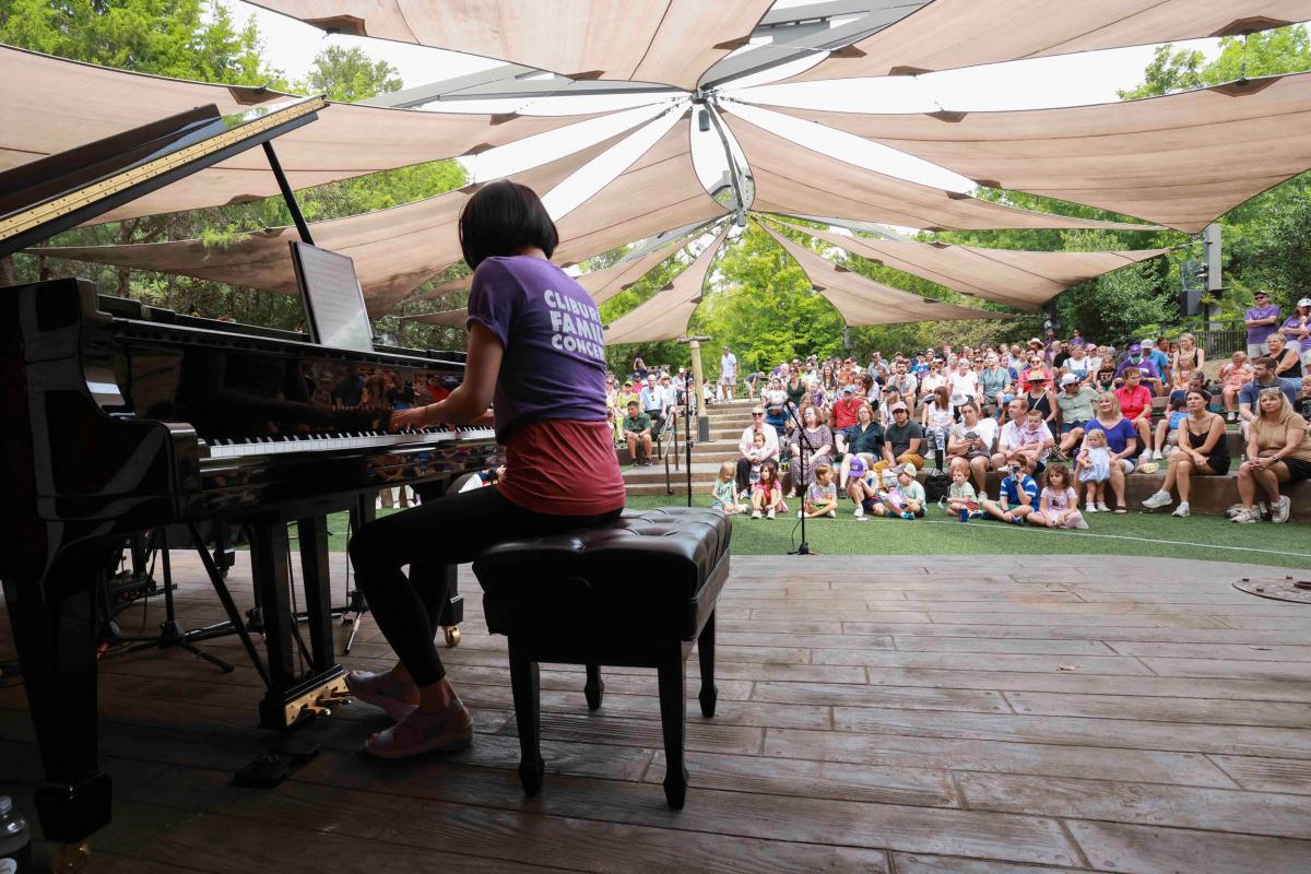 A pianist performs for a sold out crowd at the Fort Worth Zoo.