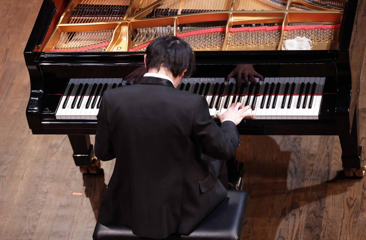 Kai-Min Chang from Taiwan performs during the Sunday evening Screening Audition at Pepsico Theater on the campus of TCU in Fort Worth, Tx. (Photo by Ralph Lauer)